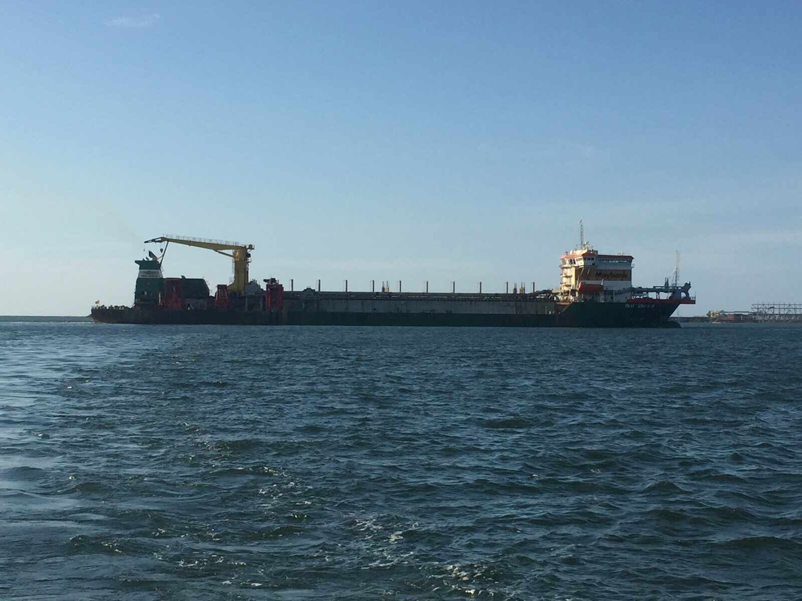 Inai Kenanga trailing suction hopper dredger seen from the water